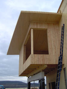 �p�tkez�s k�zben